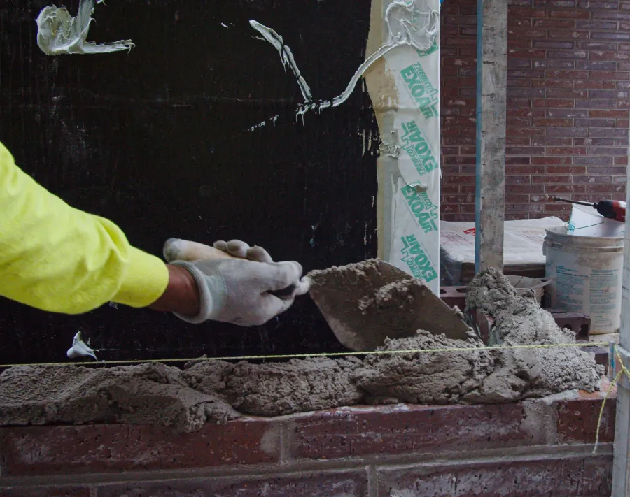 Hand and trowel